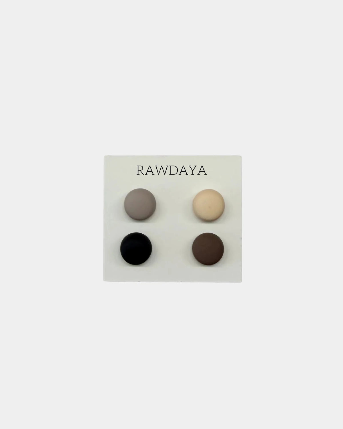 Quatre aimants à hijab finition mate sur carte Rawdaya : mauve,
kaki et deux noirs